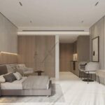 Luxury studio apartment interior with open-plan layout – modern bedroom, lounge area, and kitchenette in elegant neutral tones